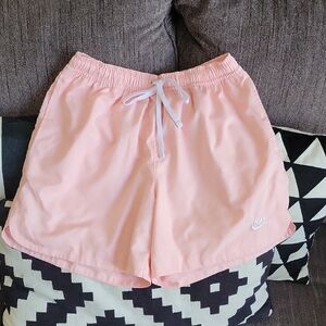 Men's light pink NIKE athletic shorts